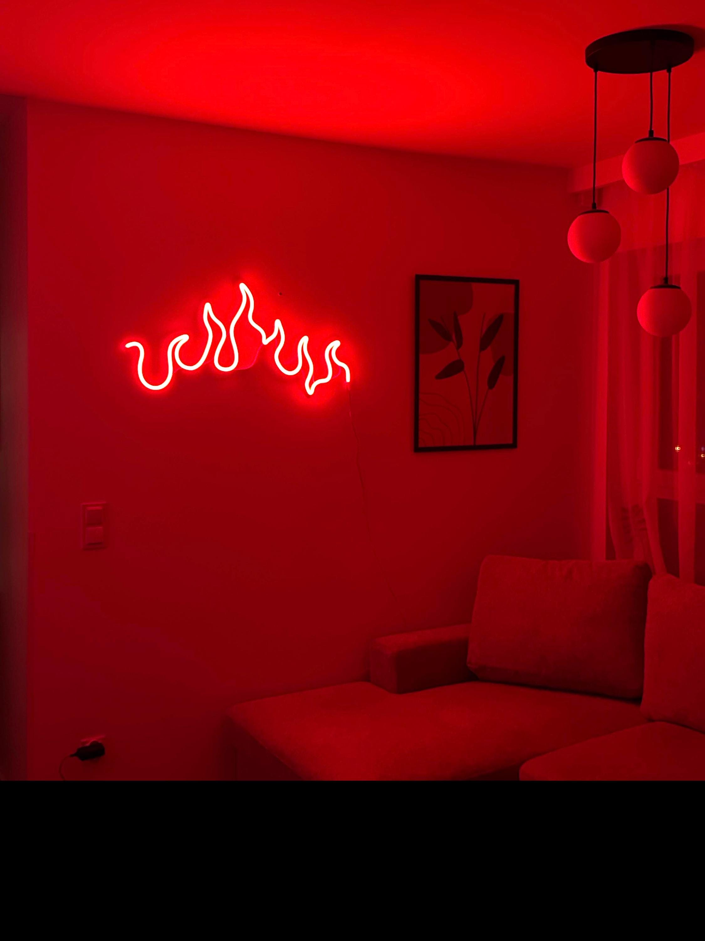 a living room with a couch and a red light
