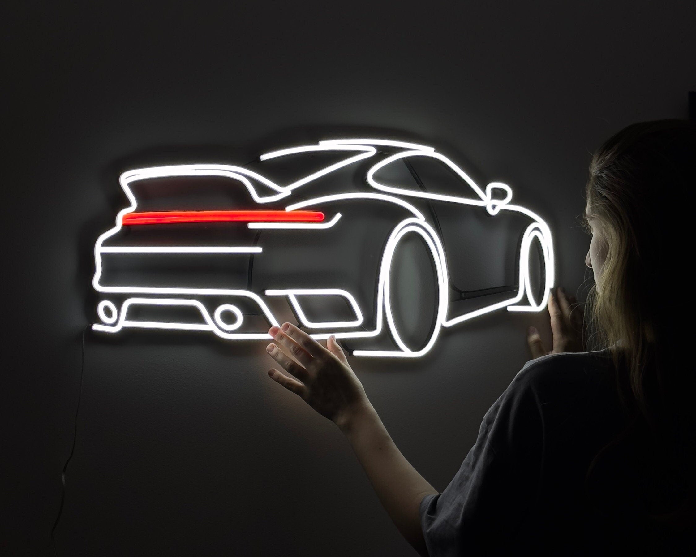 LED neon sign depicting a Porsche 911 sports car