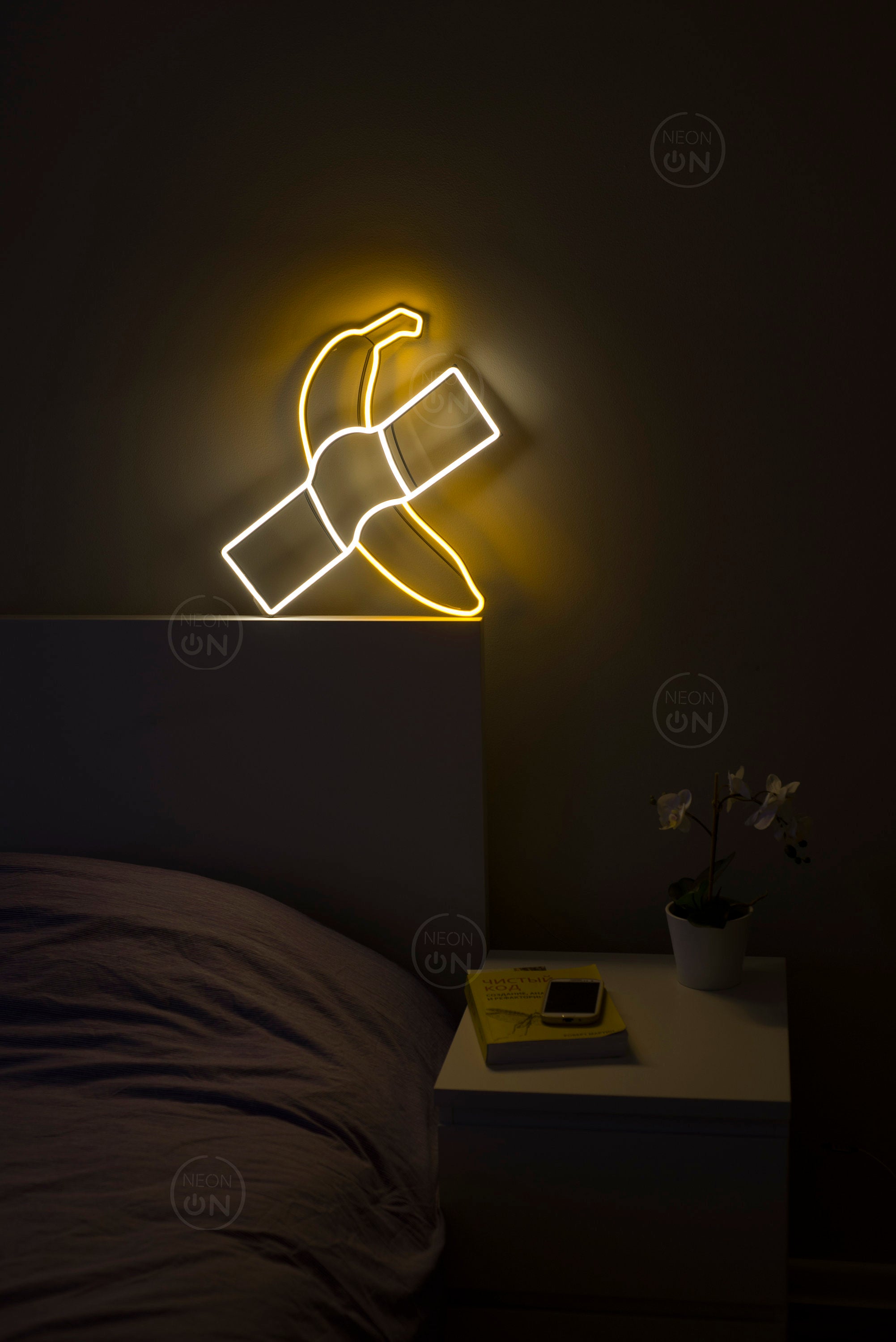 Banana taped to a wall neon sign - Neonon